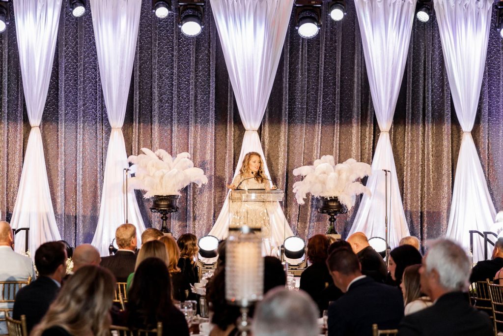 Embrace Grace founder, Amy Ford, speaks at DREAM gala